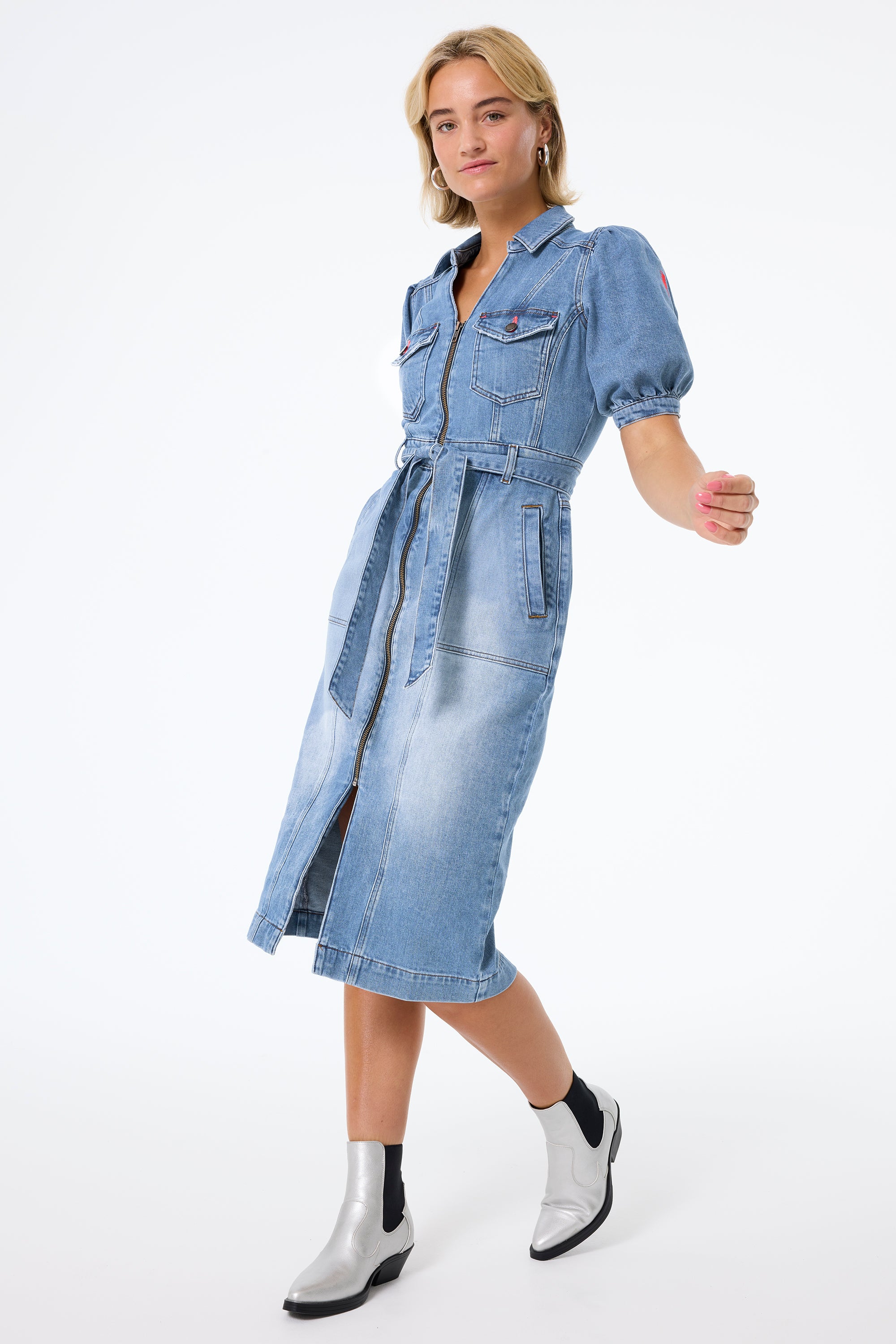 Scamp and Dude Authentic Indigo Western Denim Midi Dress | Model wearing a denim midi dress with a tie waist belt and pocket detail paired with silver boots.